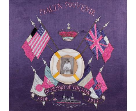 A WWI era sweetheart embroidered picture. 'Malta souvenir in memory of the war 1914-1918', with embroidered flags surrounding