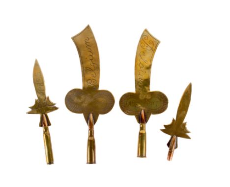 Four brass Trench Art finials. Each featuring a shaped brass panel, two engraved 'Belgium' and 'ASC 1917' (Army Service Corps