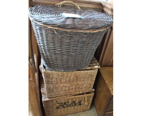 Three large vintage baskets including a Fortnum and Mason picnic hamper