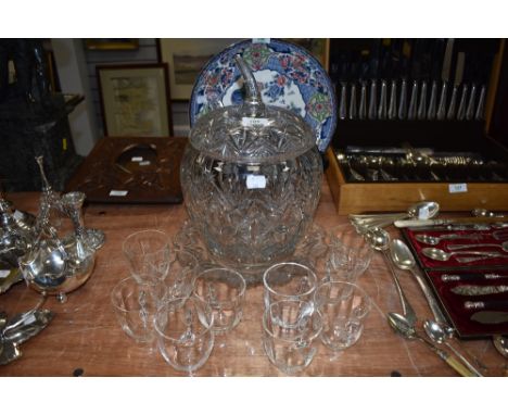 A leaded crystal glass punch bowl,with ladle and ten etched glass punch cups.