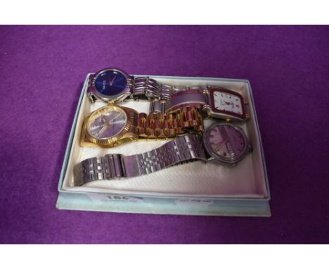 Four fashion wrist watches bearing names Rolex, Timex and Gucci