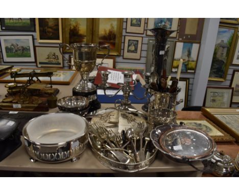 A collection of fine plated wares including candlestick holder, wine cooler , gallery tray and much more.