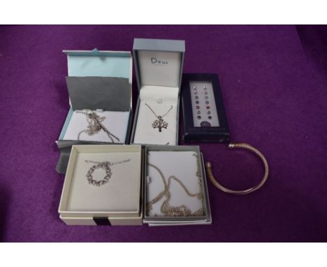 A small selection of silver and white metal jewellery including chains, pendant, earrings and bangle
