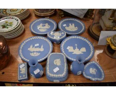 A large quantity of Wedgewood, including christmas plates, trinket dishes and vases, around fourteen items in total.