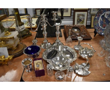 A variety of vintage fine plated wares including bon bon dishes, cruet, and candlestick holders, around twelve items.
