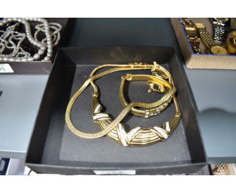 A small selection of 1980's gold plated jewellery by Monet including collarettes, bracelet and earrings