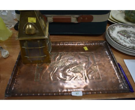An arts and crafts hammered copper tray having coy carp or similar amongst kelp and a brass and glass lamp shade having latti