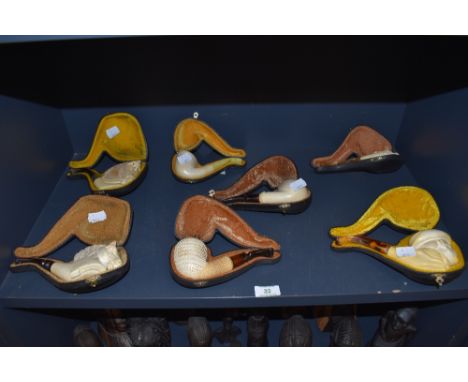 A fine selection of antique and early 20th century meershaum or sepiolite tobacco pipes various designs including horse heads