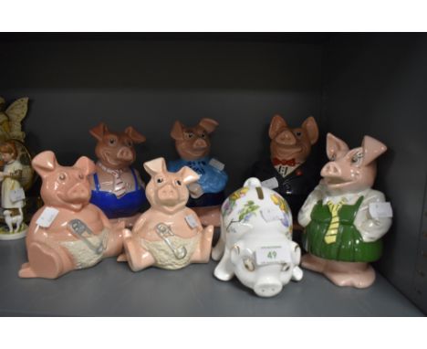 A selection of ceramic money box or piggy bank by Wade for Nat West