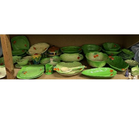 A large collection of Beswickware, Crown Devon, Carltonware and other pottery leaf decorated plates, bowls, salad servers etc