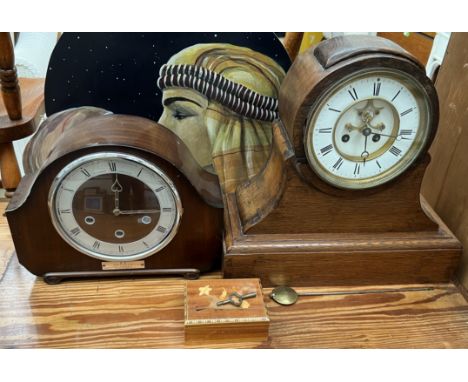An oak cased mantle clock, with an enamel dial and insight movement together with a walnut cased mantle clock and an inlaid b