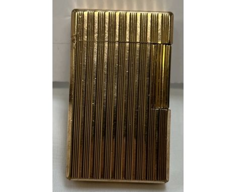A Dupont gold plated lighter with engine turned decoration, No.Z5AY30