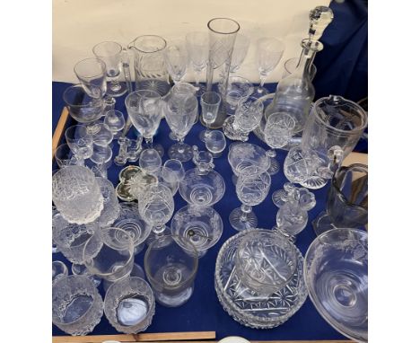 A glass decanter together with glass jugs, drinking glasses etc 