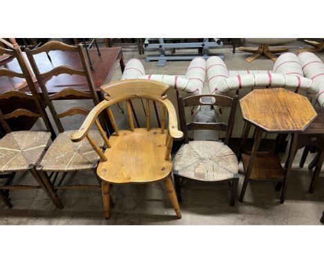 A smokers bow elbow chair together with a pair of ladder back dining chairs, a childs chair and two oak occasional tables 