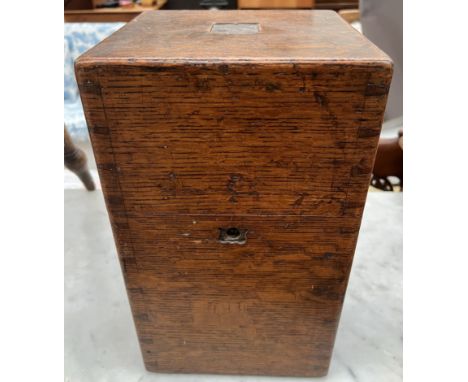 A Mappin Brothers oak decanter box of rectangular form, with a hinged lid enclosing a four division compartment