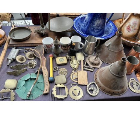 A table top scales with brass pans and chains together with two jug and basin sets, wash dollies, horse brasses, pottery mugs