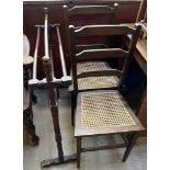 A pair of bedrock chairs and a towel rail