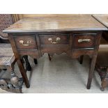 An 18th century oak lowboy,