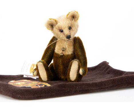 designed by German artist Britta Uhlendorff, 4 of 5, with light brown head and chest, with golden brown mohair body, black gl