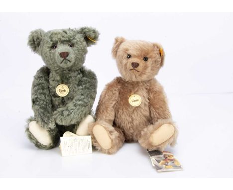 a green/ grey mohair --14 1/2in. (37cm.) high; a light brown mohair and a Steiff pencil, rubber, book mark, note pad and pape