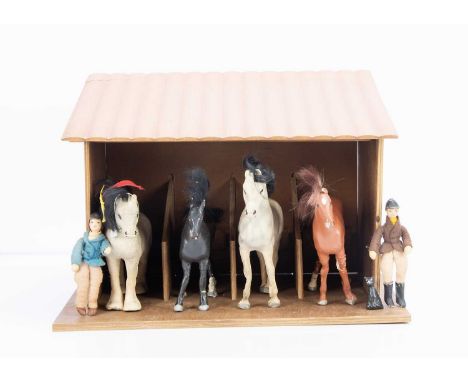 comprising sixteen ponies and horses, ten adult and children figures, blankets, saddles and tack, black cat, terrier and dove