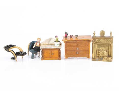 two Schnegass pieces —4in. (10cm.) largest (damage to large drawers); two animal bone chairs; an all bisque boy doll with mou