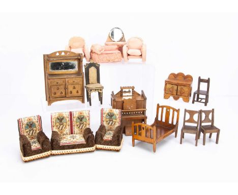 a buffet with mirrored back, single bed —5 1/4in. (13.5cm.) long and chest of drawers; a pink cloth covered dressing table an