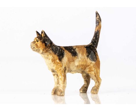 wooden painted white, black and light brown with raised tail —1 3/4in. (4.5cm.) long