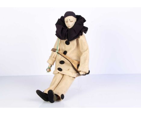 with pressed felt sad face, narrowed brown painted eyes, elongated boudoir type cloth body with felt hands and boots, origina