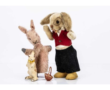 a Steiff post- war Nikili rabbit with swivel head jointed arms, internal felt body, button to ear and squeaker --13 1/2in. (3