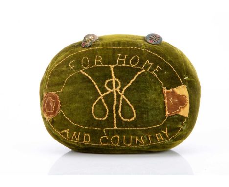green velvet embroidered with intertwined WI and FOR HOME AND COUNTRY in gold and two WI enamel badges —9in. (23cm.) wide