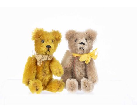 one with golden mohair, the other with light brown mohair both with metal pin eyes, black stitched noses, mouths and metal fr