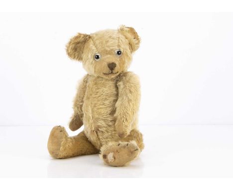 clear and black glass eyes, black stitched nose, mouth and claws, swivel head, with jointed limbs, fabric pads and working gr