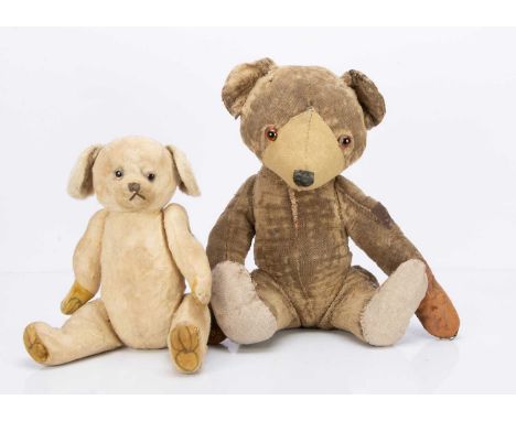 a Moritz Pappe teddy bear cub with brown wool plush, orange and black glass eyes, black fabric replacement nose, swivel head 