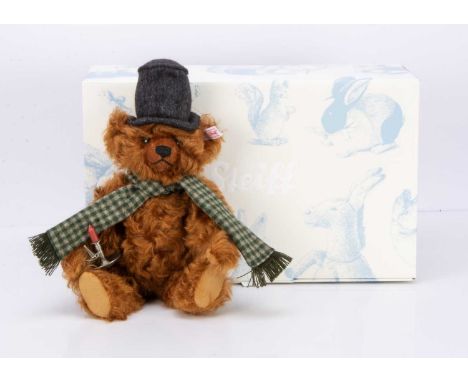 592 of 1500, with chestnut mohair, grey felt top hand and holding a candle stick, in original box with certificate --13 3/4in