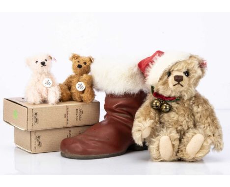543 of 4000, with red velvet cap, in original box with certificate --8 /14in. (21cm.) high; and two Steiff Club gift bears fo