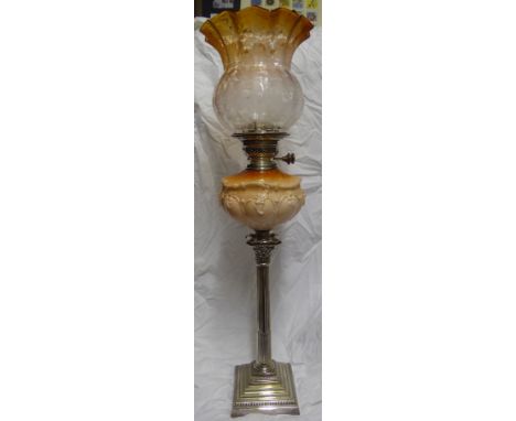 A plated Corinthian column Table Oil Lamp with moulded glass reservoir and etched shade, 29" (74cms) high.
