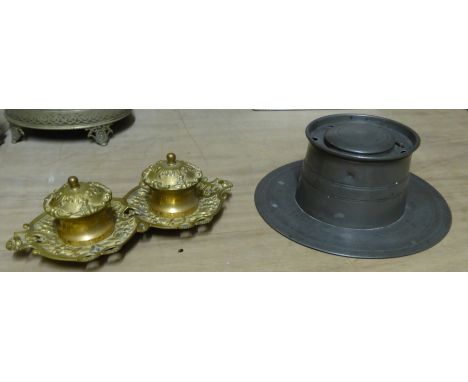 A 19th century Pewter Capstan Inkwell, and a Rococo style brass Inkstand fitted with two covered inkwells. 