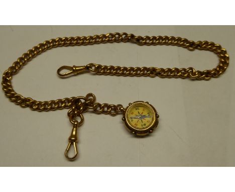 A 9ct gold curb link Watch Chain hung with a cornelian fob inset with a small compass, 61.8g.
