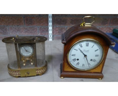 A Mantle Clock, the white dial inscribed "Comitti of London" in domed mahogany case, and another Mantle Clock with musical mo