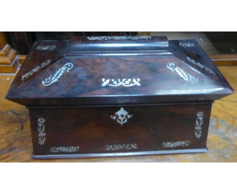 A Victorian rosewood Tea Caddy inlaid with mother of pearl, the interior fitted with two covered containers and bowl recess. 