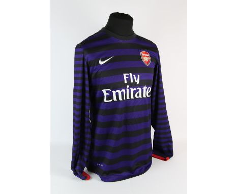 Arsenal Football club, Johan Djourou (No.20) bench worn shirt for their league Cup 5th round game against Bradford on the 11 