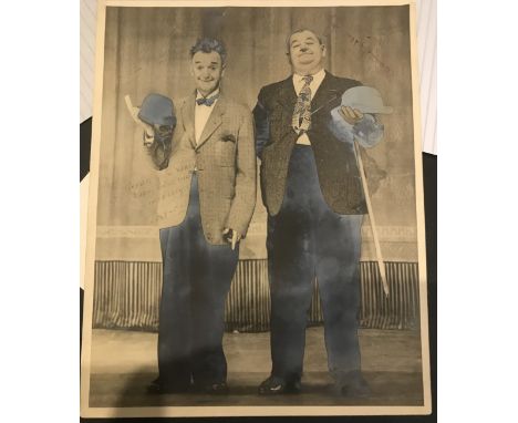 Laurel and Hardy signed large 12 x 9 1/2 inch sepia vintage photo, some silvering to image and Laurel autograph light, inscri