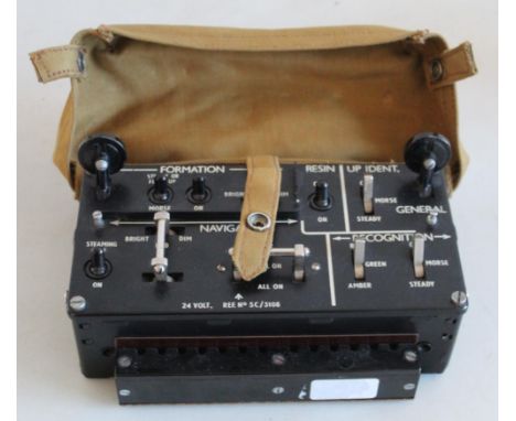 WWII Lancaster Bomber lighting control panel with canvas covering. Also with assortment of militaria including cap badges, bu