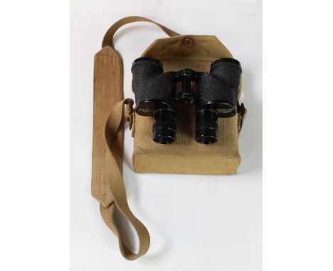 Pair of Military binoculars. 6x30 C.G.B. 53 G.A. Canada dated 1944, with crows foot arrow. In military webbing case dated 194