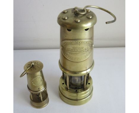 British Coal Mining Company of Wales UK mining lamp from the Aberaman Colliery (H22cm) and a second Eccles Colliery lamp (H11