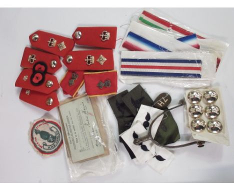 Large collection of military cap badges, buttons, pins, and patches. Including an assortment of naval patches such as the H.M