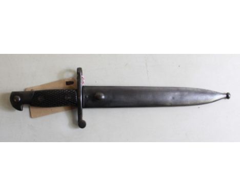 Spanish M1941 Bolo blade Bayonet stamped FN Toledo to ricasso, with plastic two-piece handle and original steel scabbard. Ser