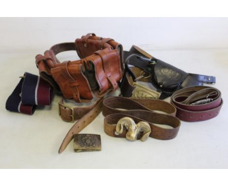 Collection of miliary belts, including a reproduction U.S. Army civil war belt, a tan leather ammunition belt, an Austro-Hung