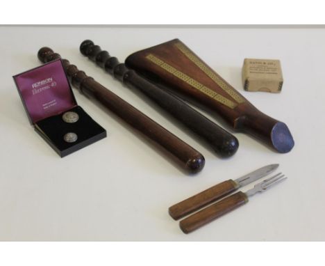 C19th century cribbage board made from rifle butt with brass mounts and inlays; two wooden truncheons (L41cm); travelling kni